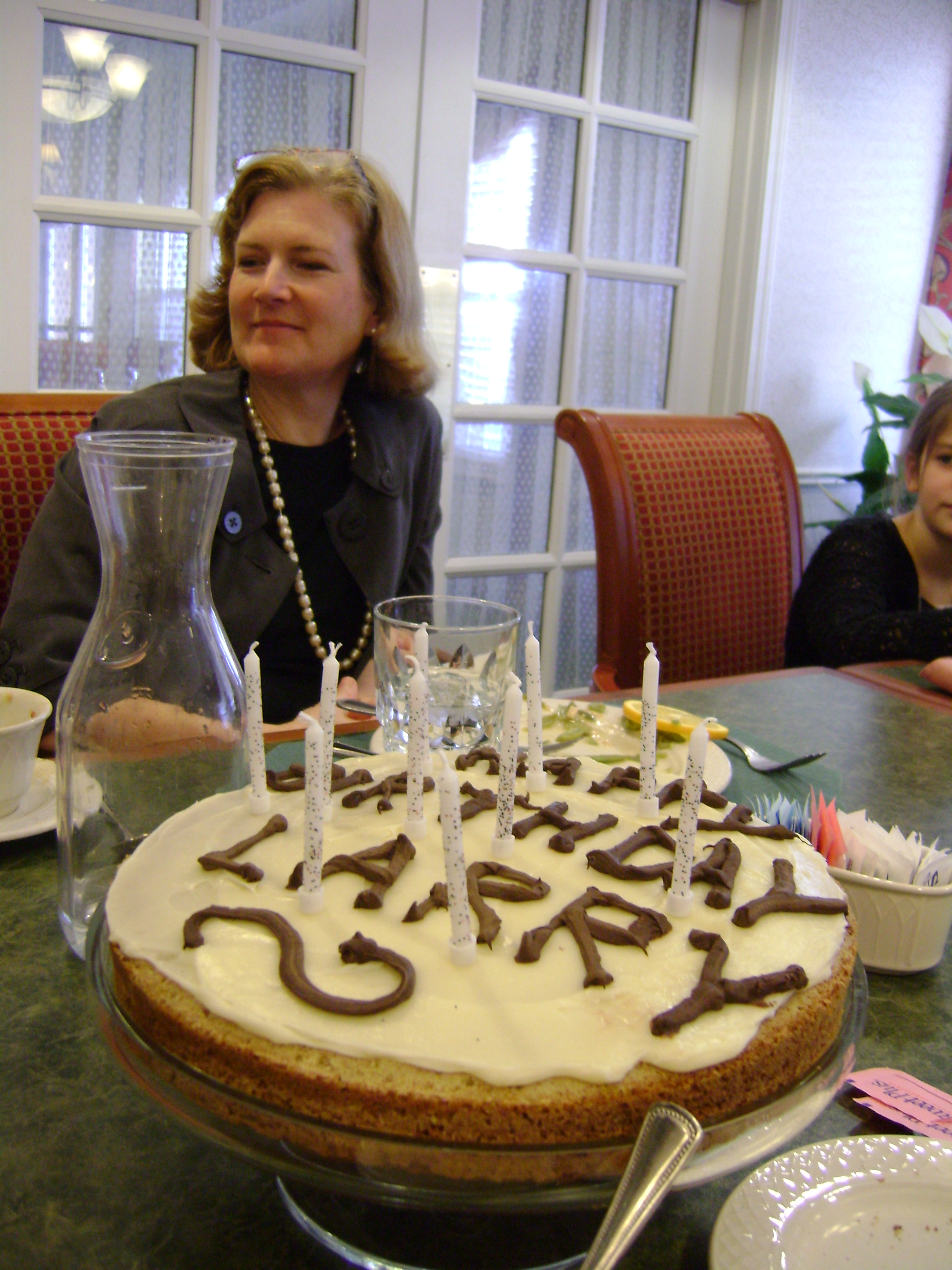 Eirka and the cake she made for Dad