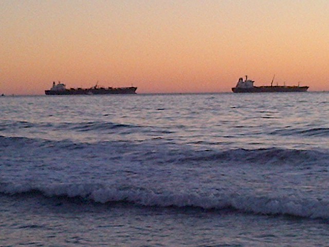 Ships parked by Dockweiler State Beach, near LAX, CA
