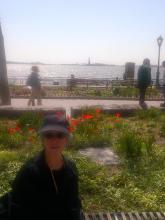 Grace with the statue of liberty in far background