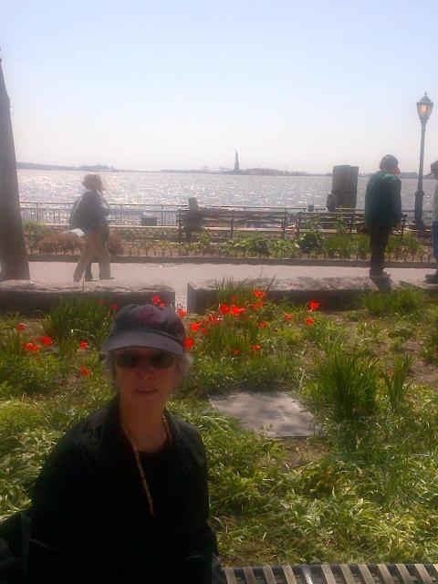 Grace with the statue of liberty in far background